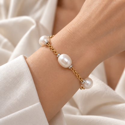18ct yellow gold pearl and diamond bracelet worn on wrist