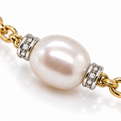 Pearl with white gold diamond set spacer detail