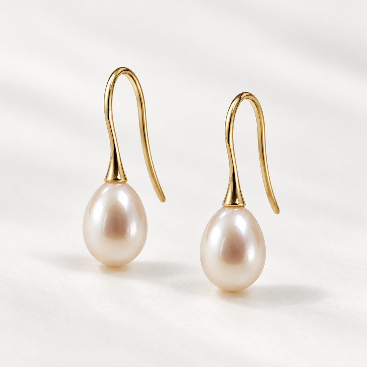 Pearl drop earrings in 18ct yellow gold - pair view