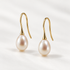 Pearl drop earrings in 18ct yellow gold - pair view