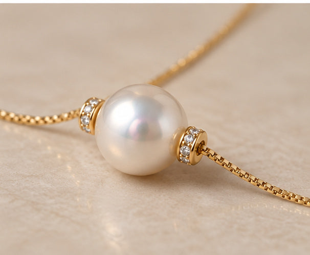 Pearl and diamond detail on 18ct yellow gold necklace