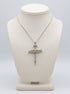 18ct white and yellow gold 1.05ct diamond nail cross necklace on ivory bust — main product image