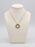 18ct yellow gold 0.79ct diamond swirl necklace on ivory jewellery bust