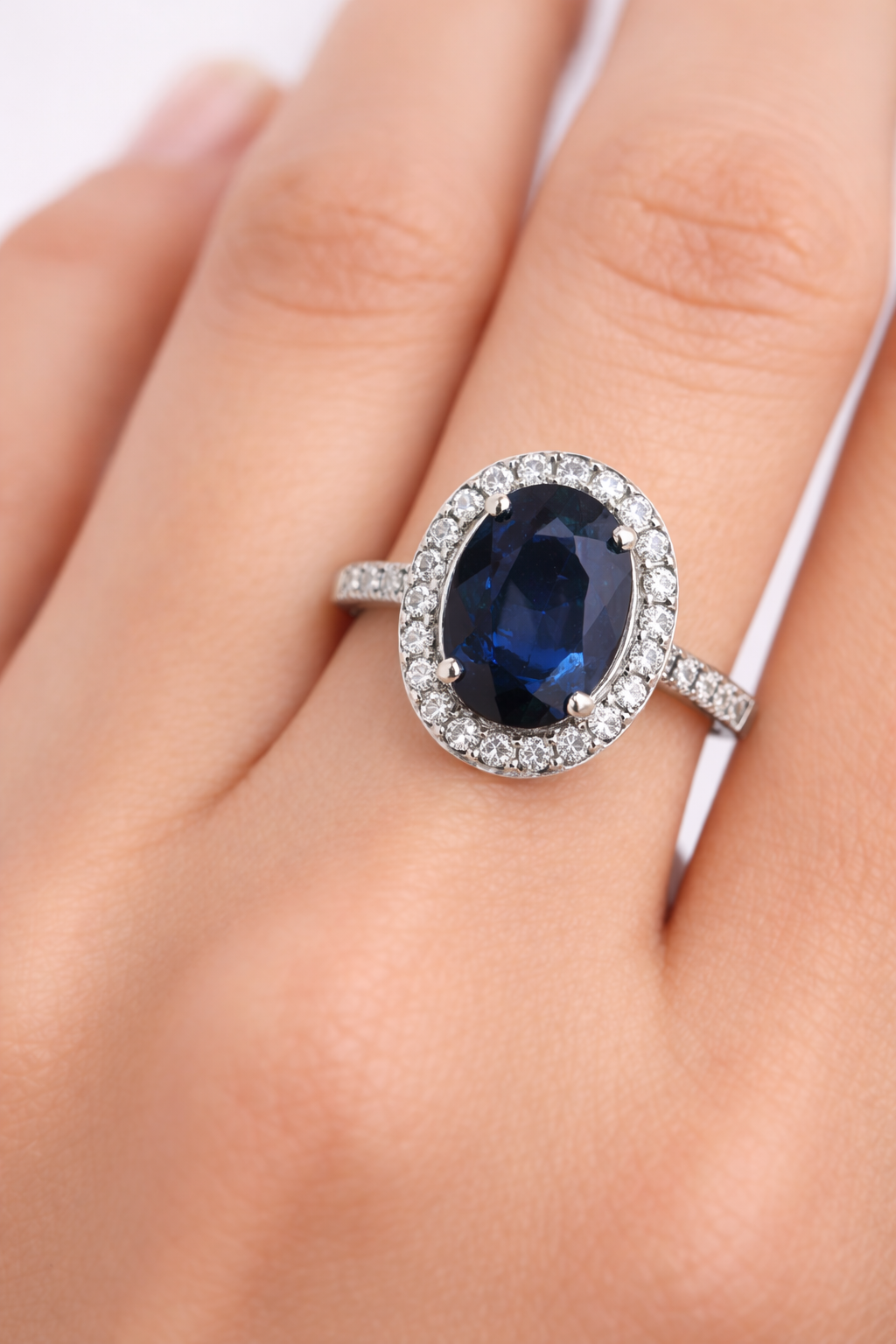 Oval Sapphire &amp; Diamond Halo Ring