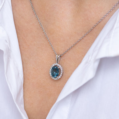 Oval Topaz Pendant with Diamond Halo