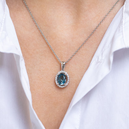 Oval Topaz Pendant with Diamond Halo