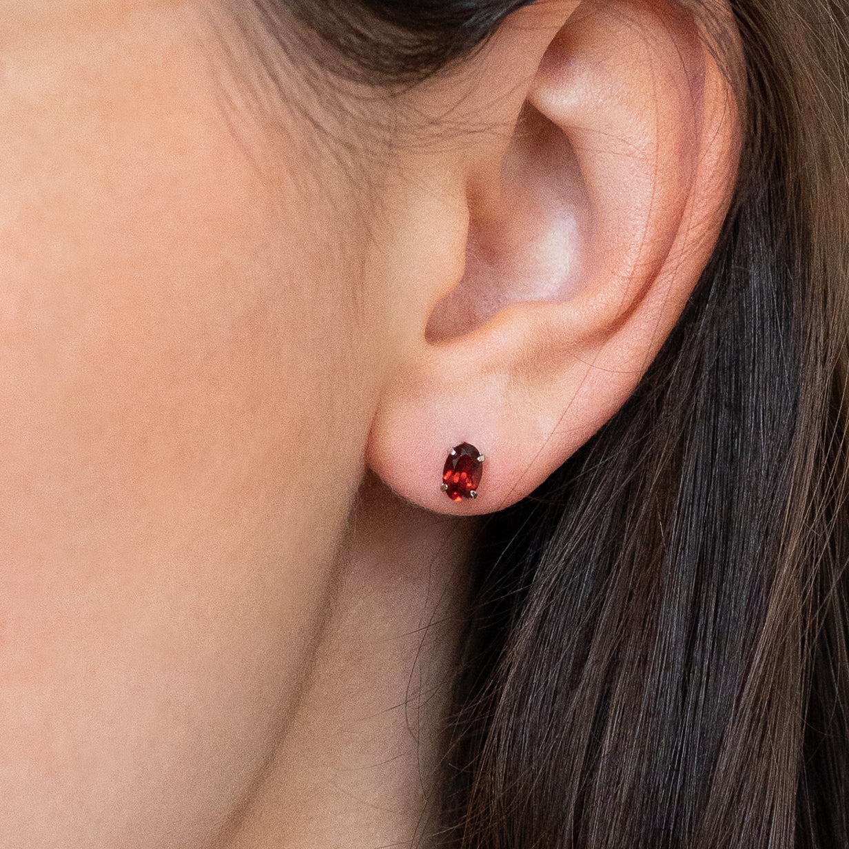 Garnet Stud Earrings in White Gold