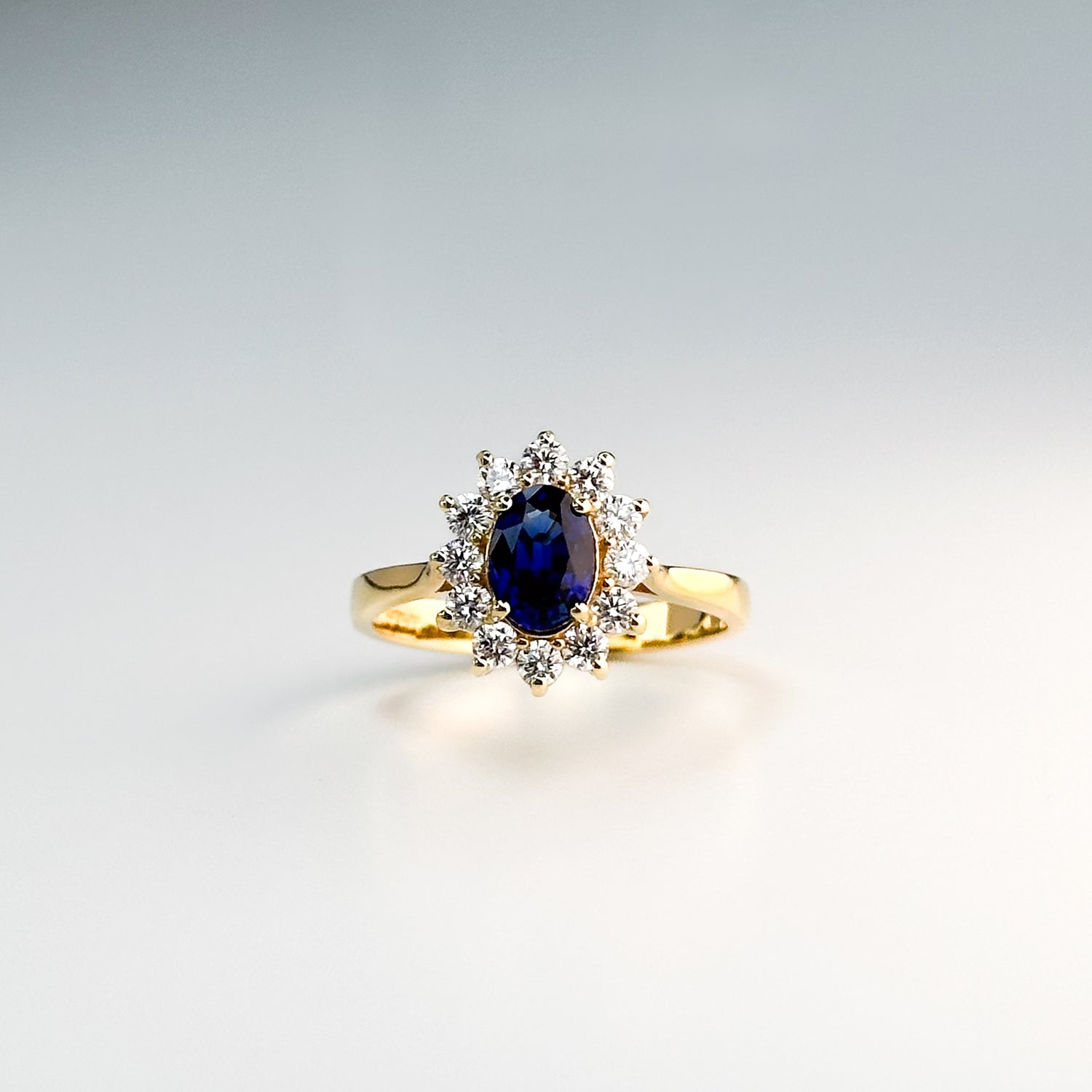 0.83ct Oval Cut Deep Blue Sapphire Ring