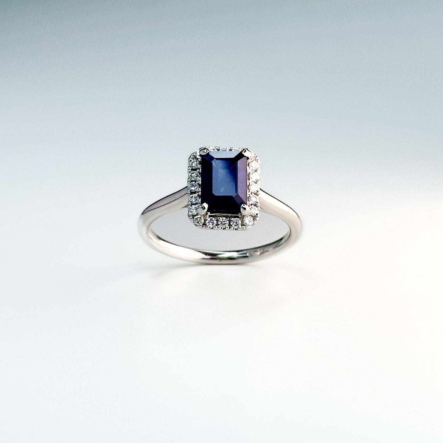 1.43ct Emerald Cut Deep Blue Sapphire Ring