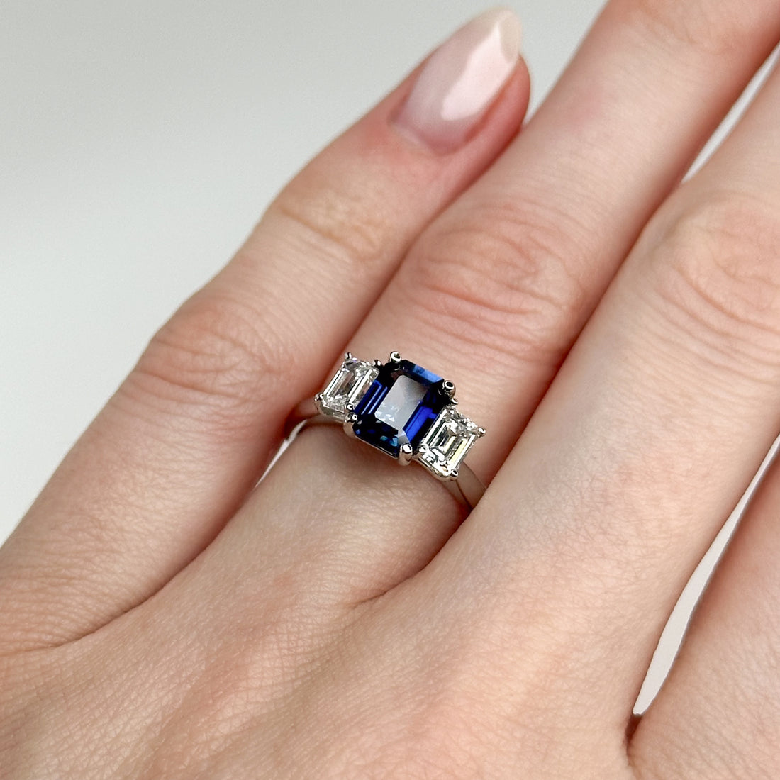 Emerald Cut Blue Sapphire and Diamond Ring