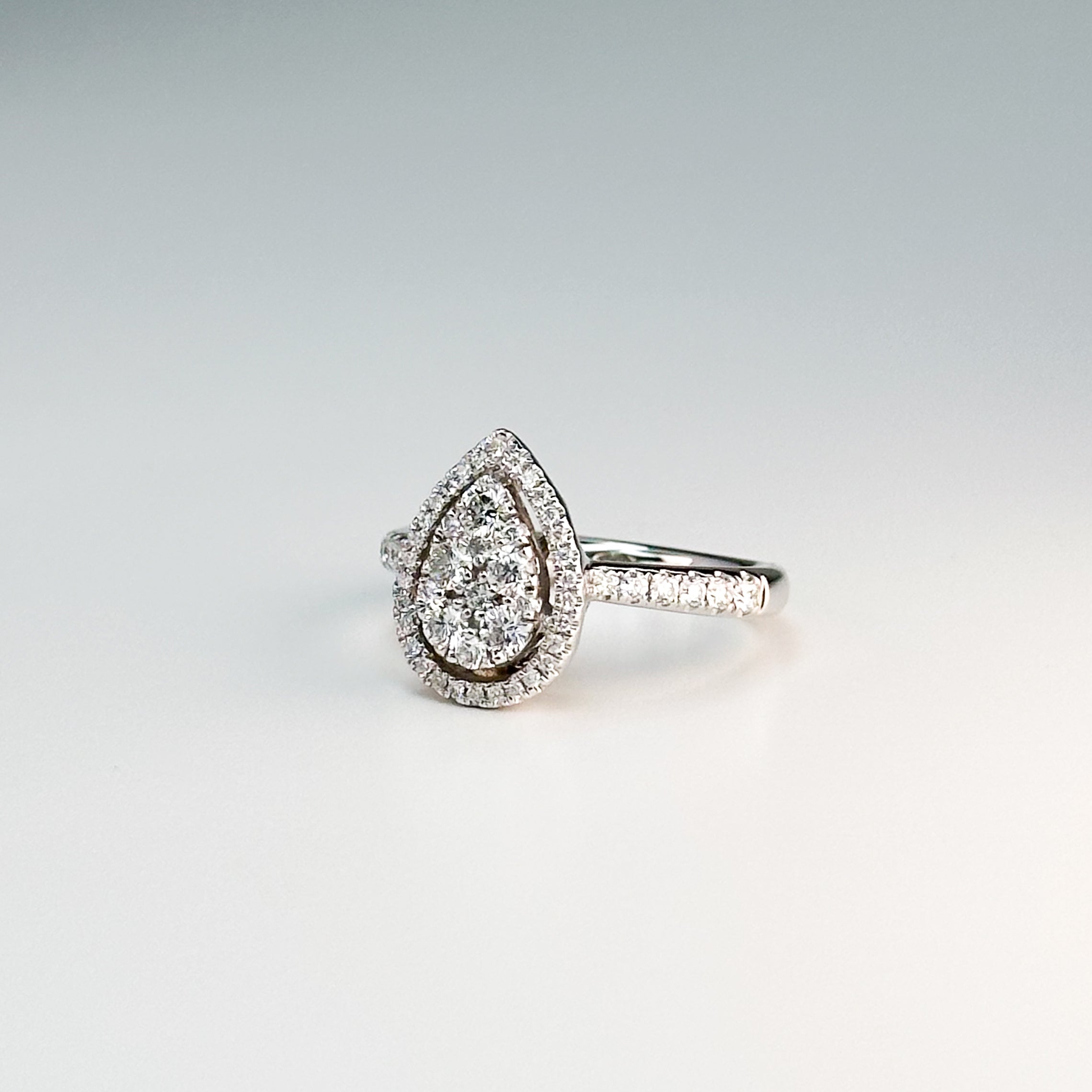 0.80ct Pear shape Diamond Cluster Ring with Halo