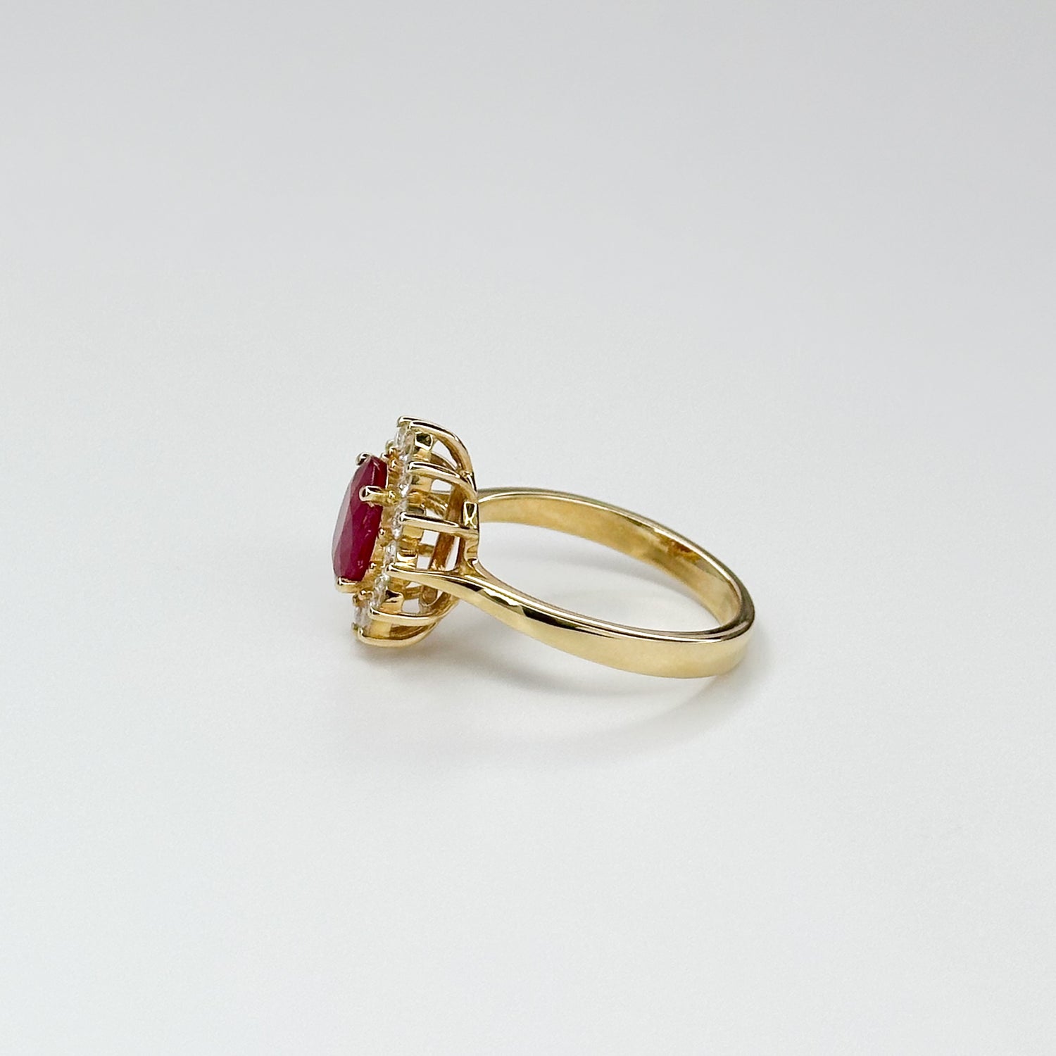 1.70ct Oval Cut Ruby Ring with Diamond Halo