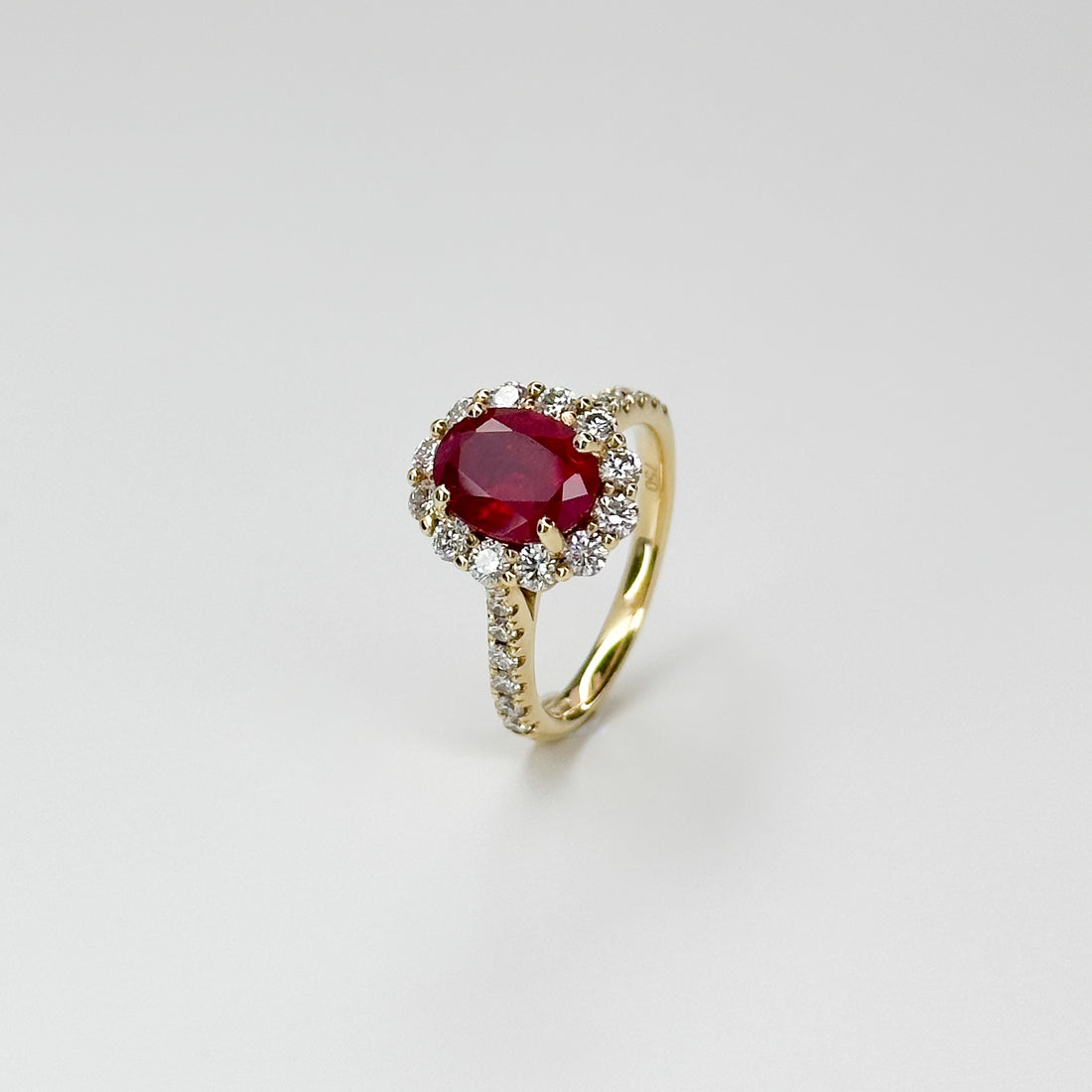 2.75ct Oval Cut Ruby Ring with Diamond Halo