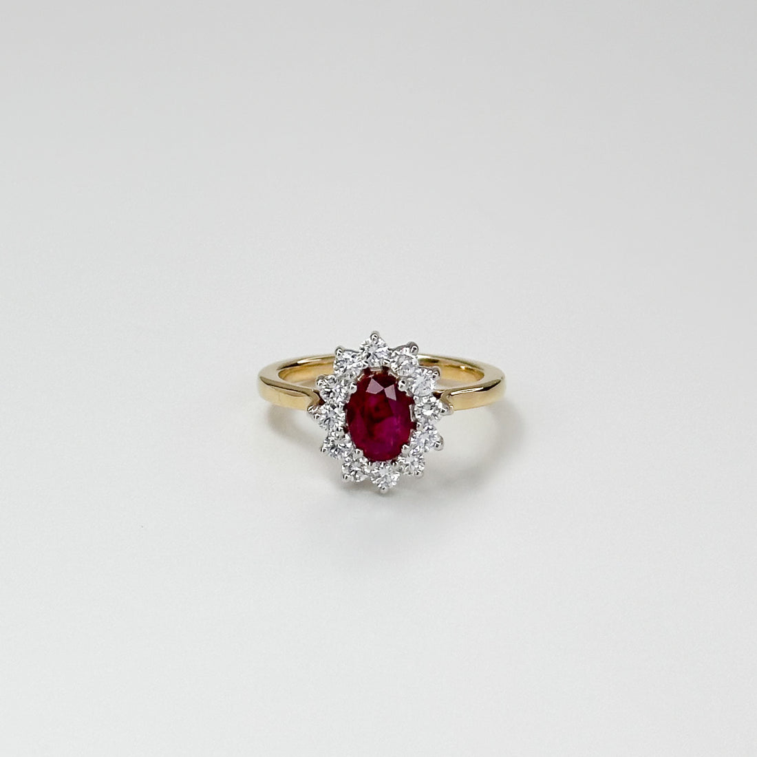 1.05ct Oval Cut Ruby Ring with Diamond Halo