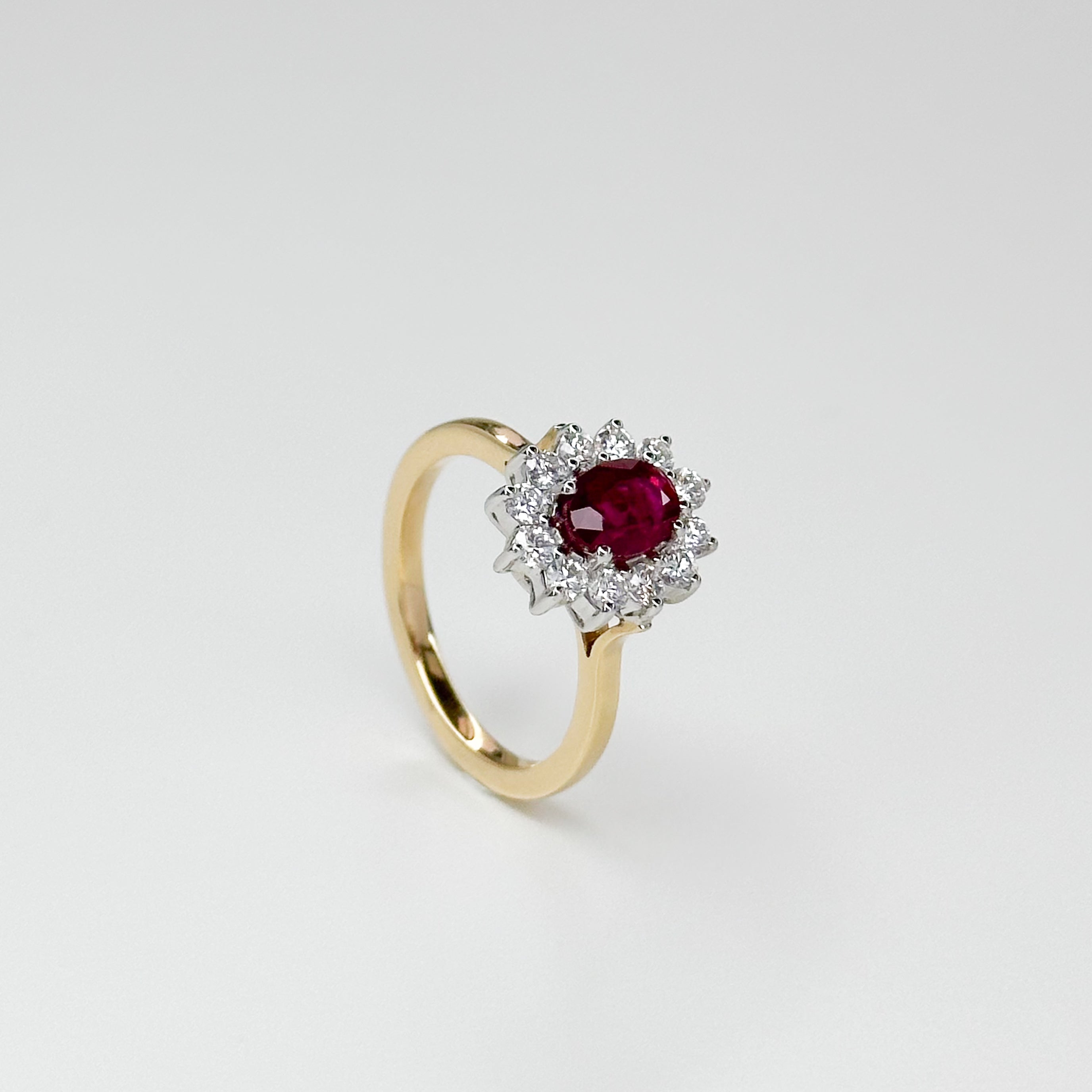 1.05ct Oval Cut Ruby Ring with Diamond Halo