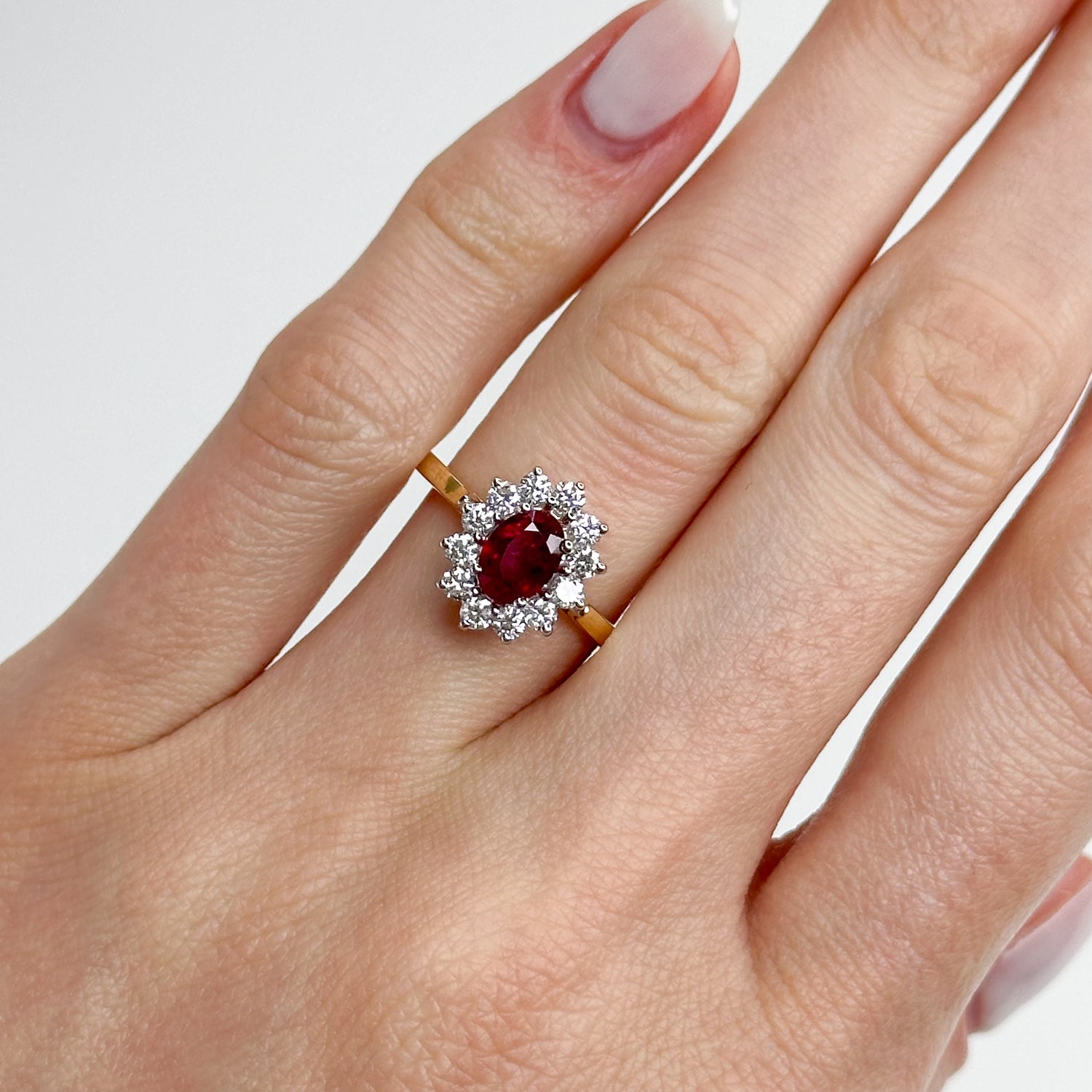 1.05ct Oval Cut Ruby Ring with Diamond Halo