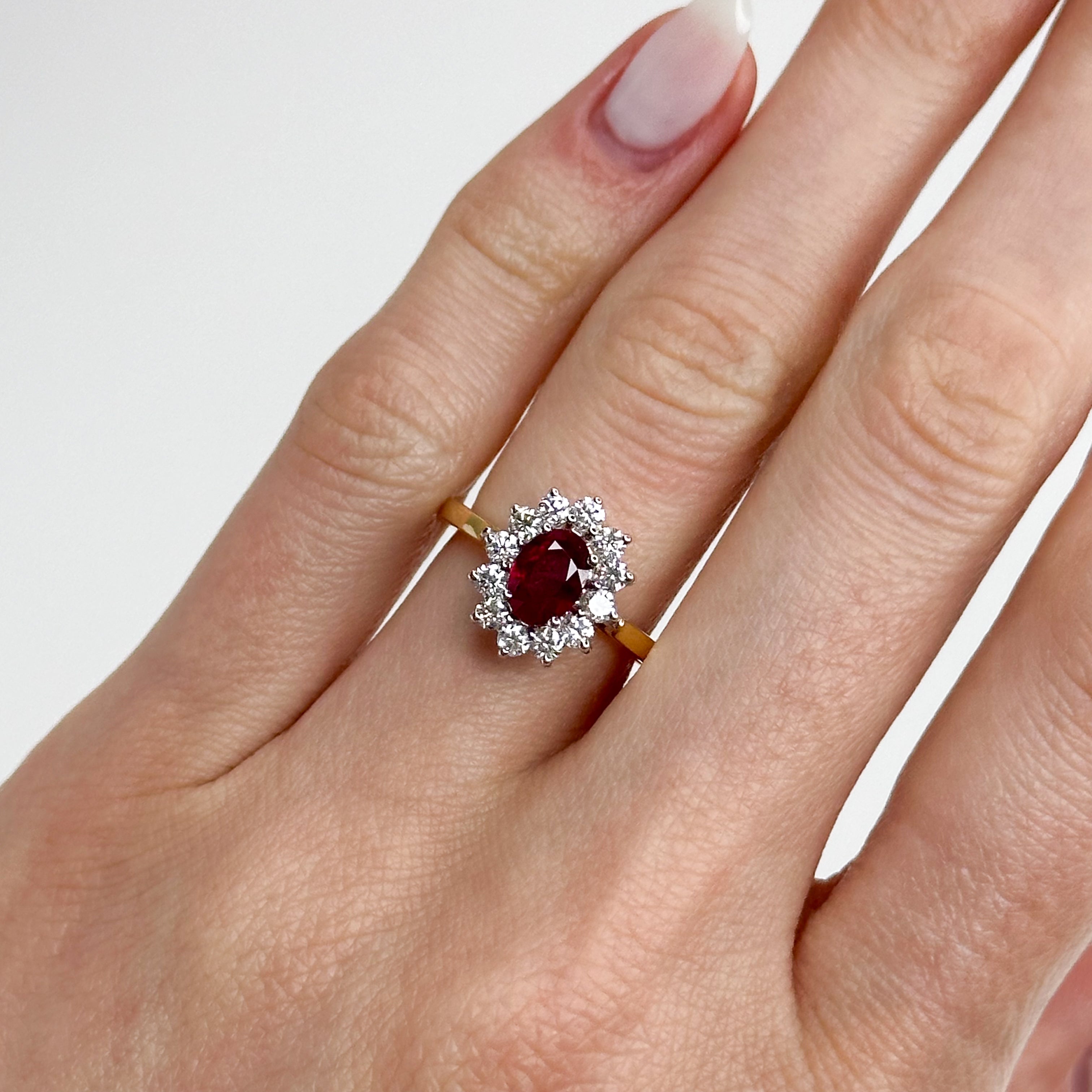 1.05ct Oval Cut Ruby Ring with Diamond Halo