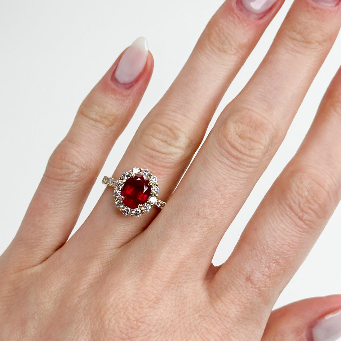 2.75ct Oval Cut Ruby Ring with Diamond Halo