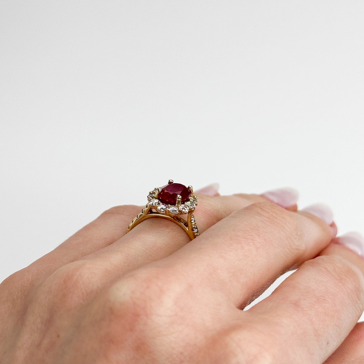2.75ct Oval Cut Ruby Ring with Diamond Halo
