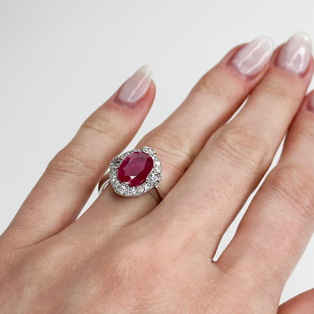 3.23ct Oval Cut Ruby Ring with Diamond Halo