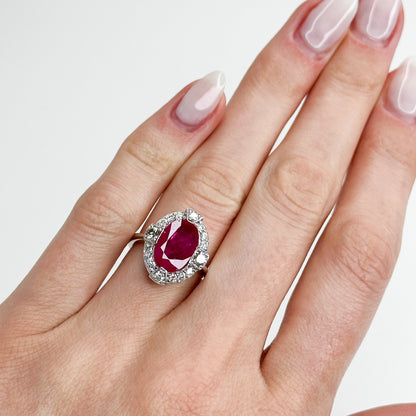 3.23ct Oval Cut Ruby Ring with Diamond Halo