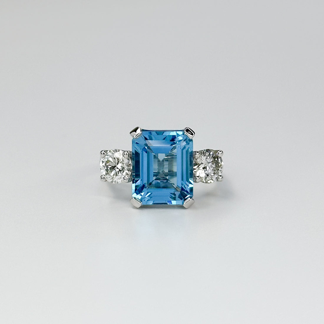 Blue Topaz Trilogy Ring with Diamonds
