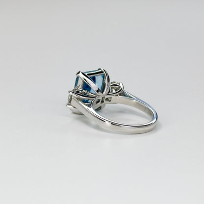 Blue Topaz Trilogy Ring with Diamonds