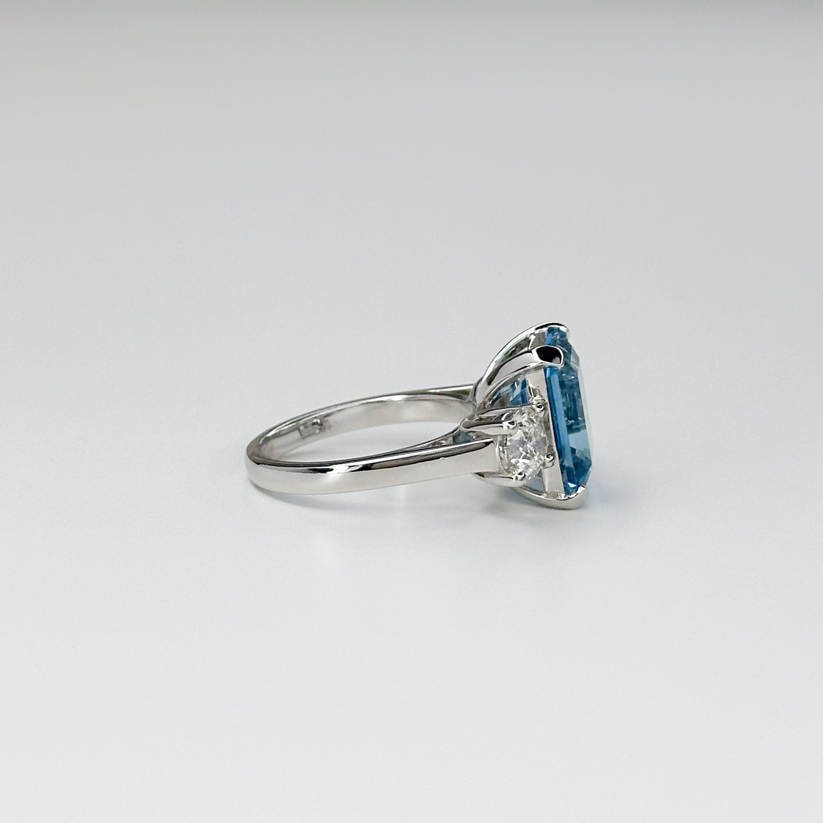 Blue Topaz Trilogy Ring with Diamonds