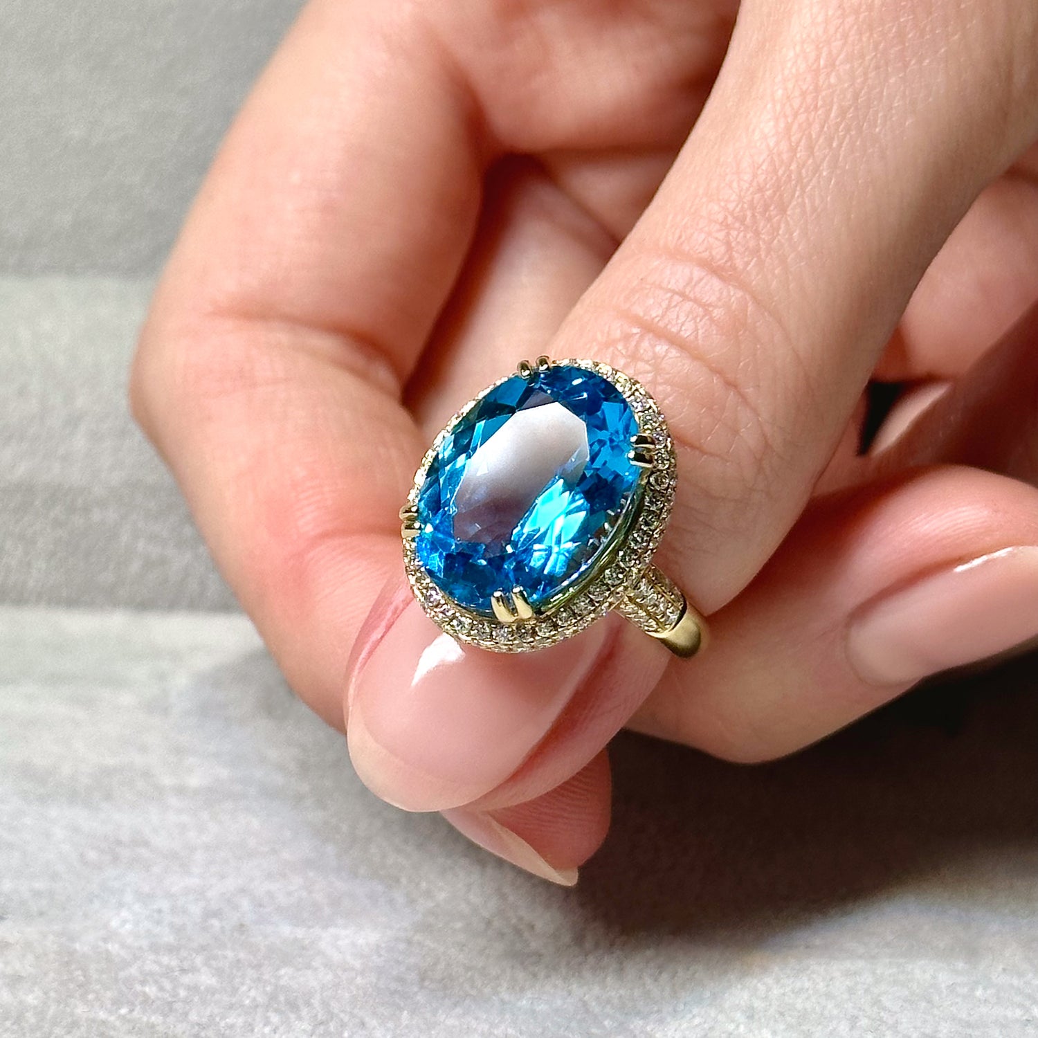 Blue Topaz Oval Cut Ring with Diamonds