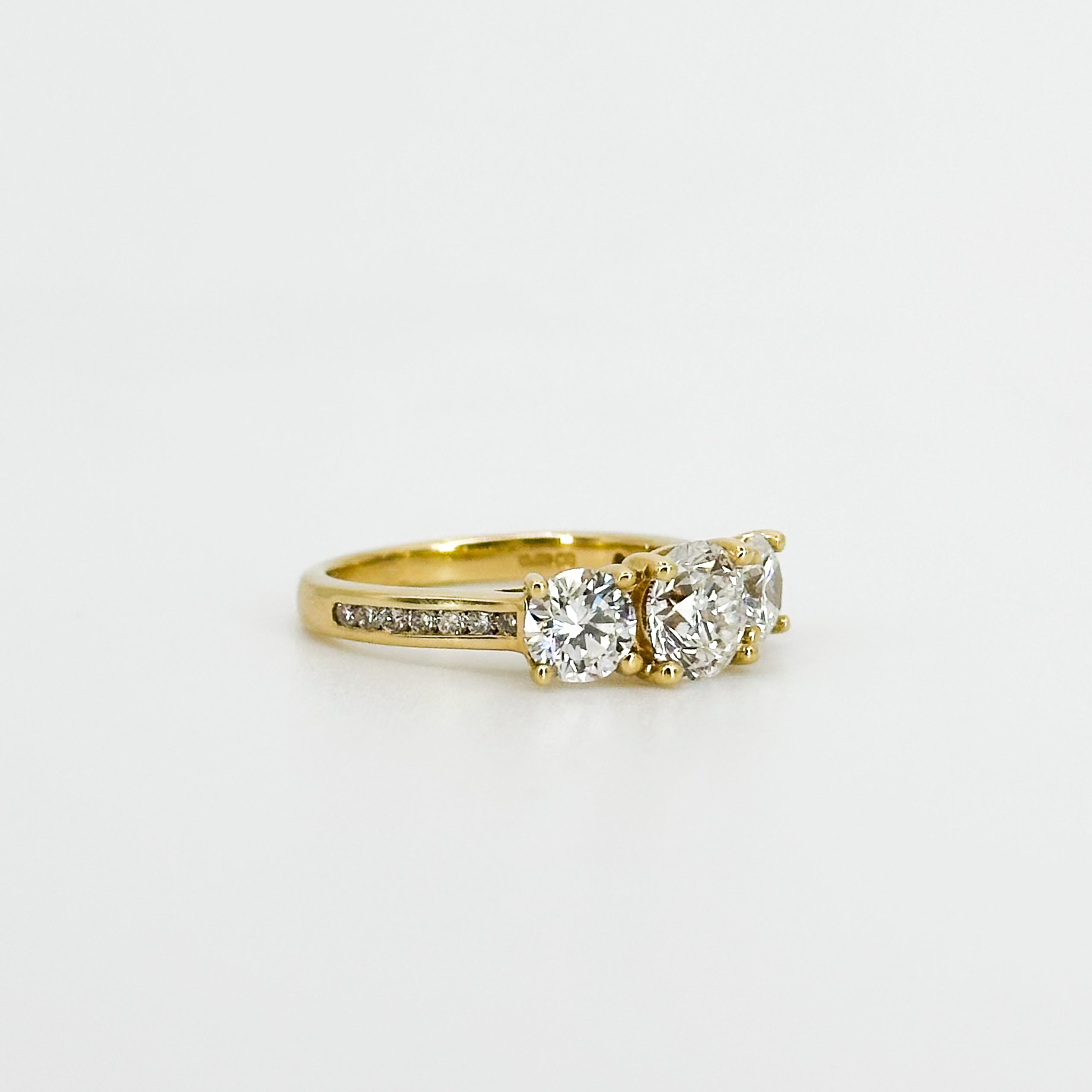 Trilogy Ring with GIA Diamond in 18ct yellow gold