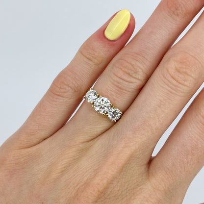 Trilogy Ring with GIA Diamond in 18ct yellow gold