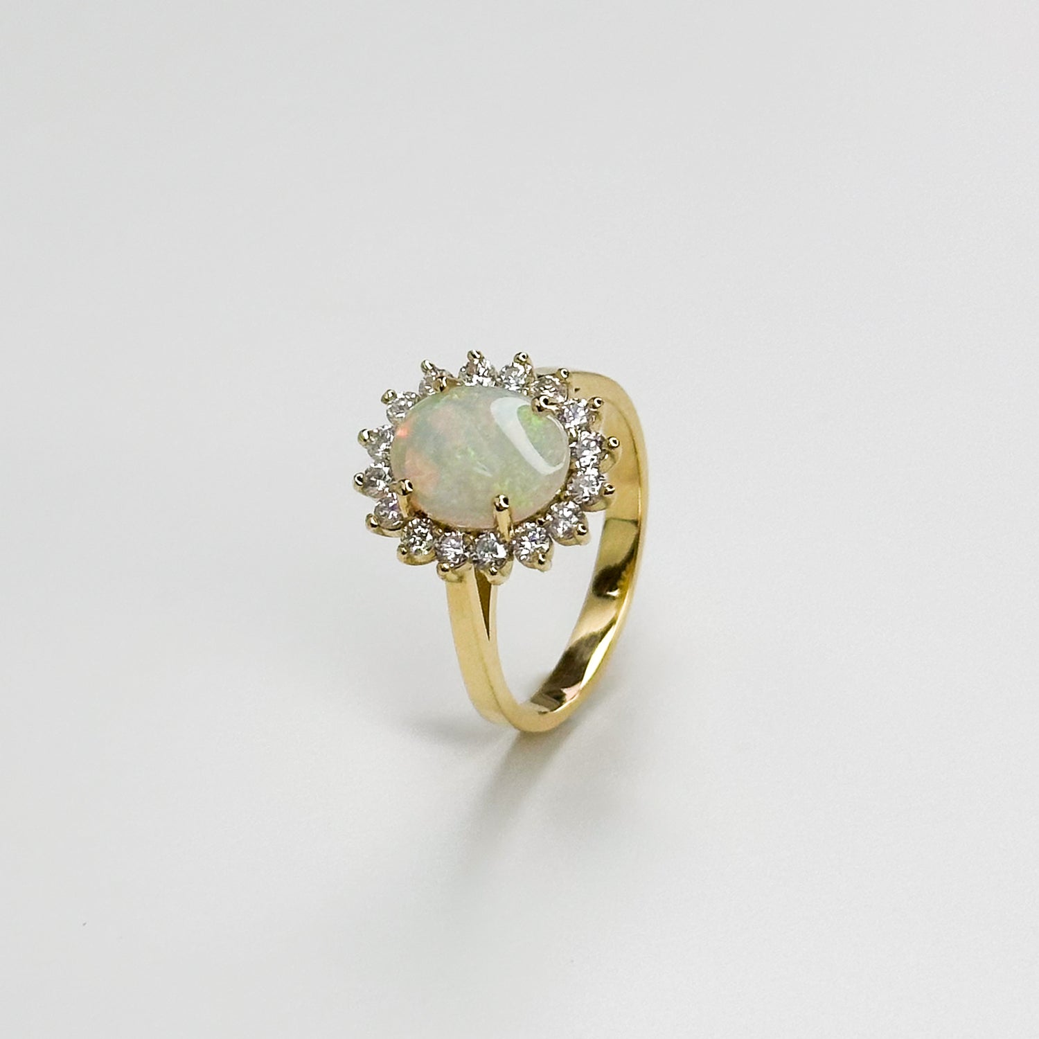 2.50ct Oval Opal Ring with Diamond Halo