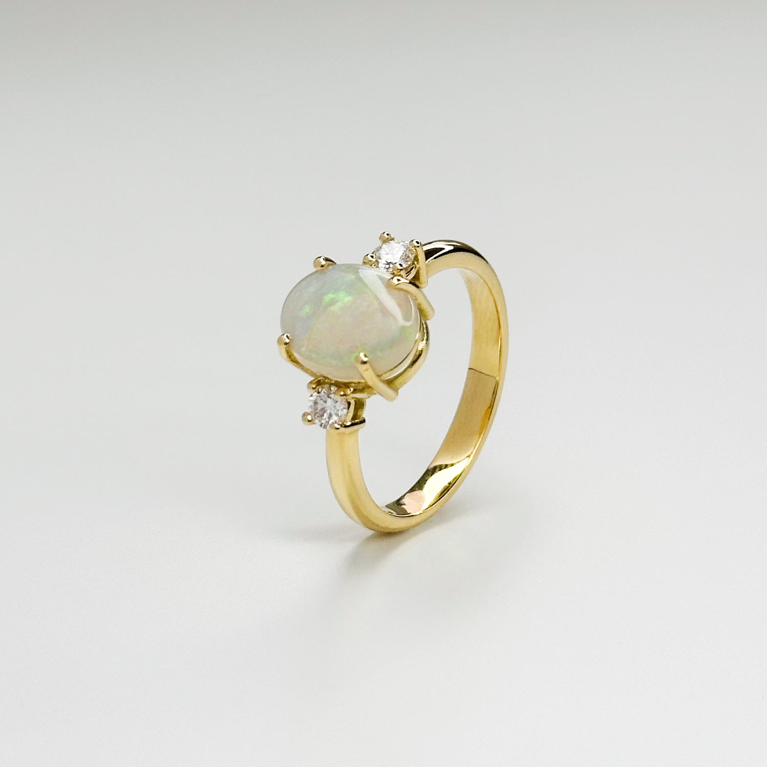 2.65ct Oval Opal and Diamond Trilogy Ring