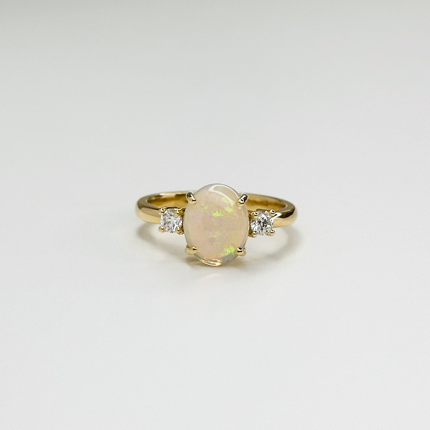 2.65ct Oval Opal and Diamond Trilogy Ring