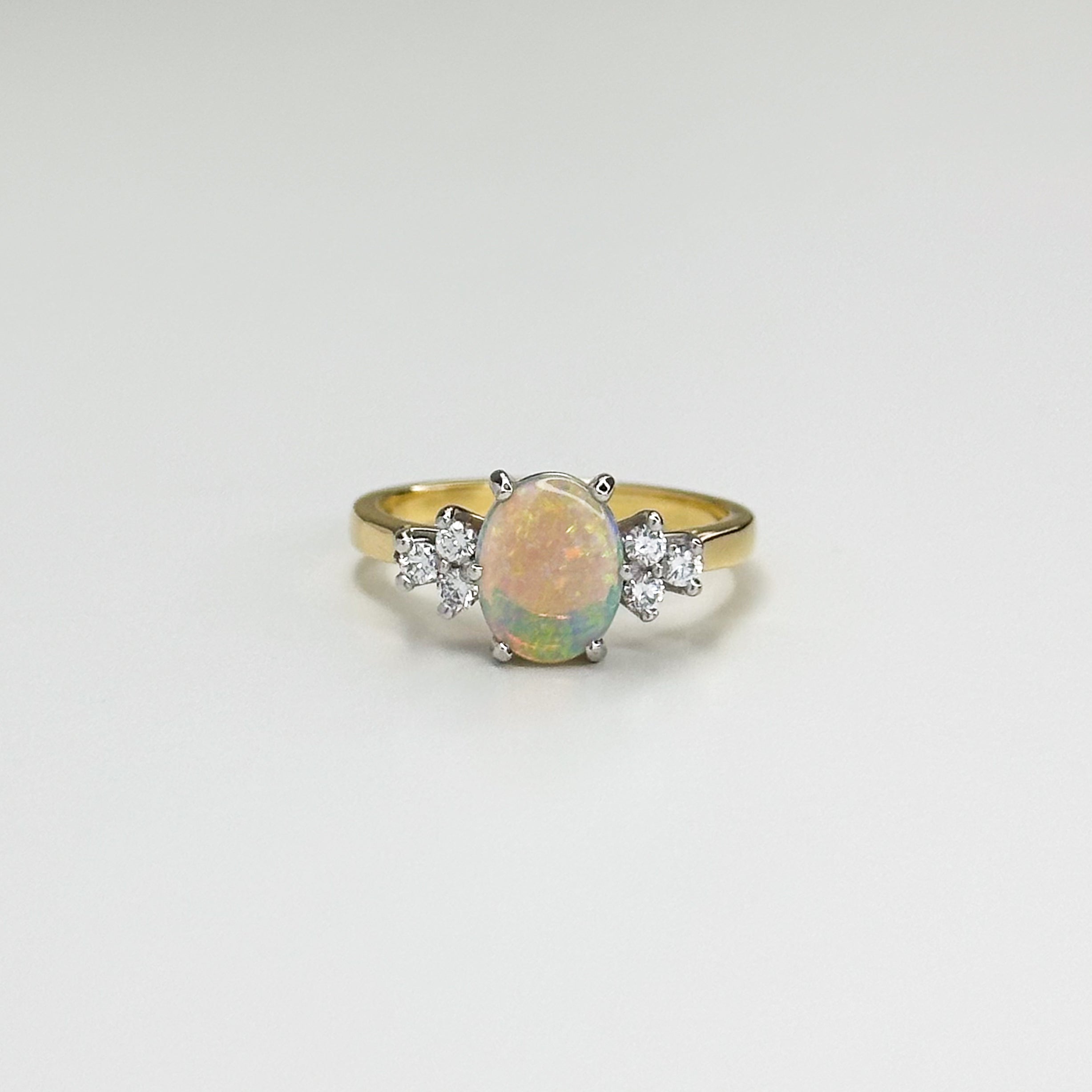 1.10ct Oval Opal and Diamond Ring