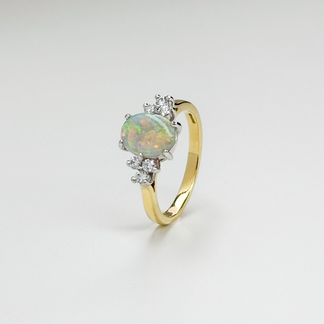 1.10ct Oval Opal and Diamond Ring