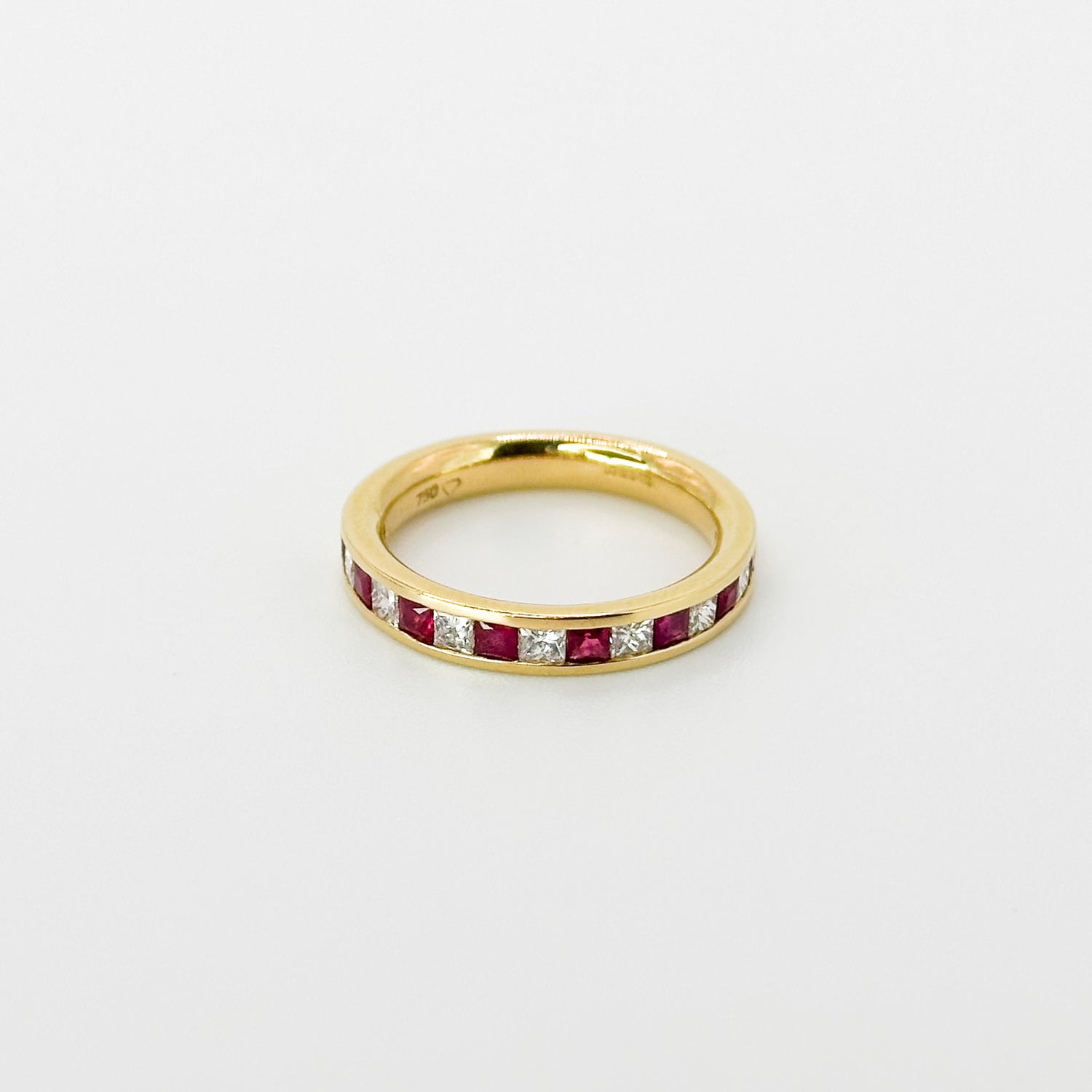 Ruby and Diamond Eternity Ring in Yellow Gold