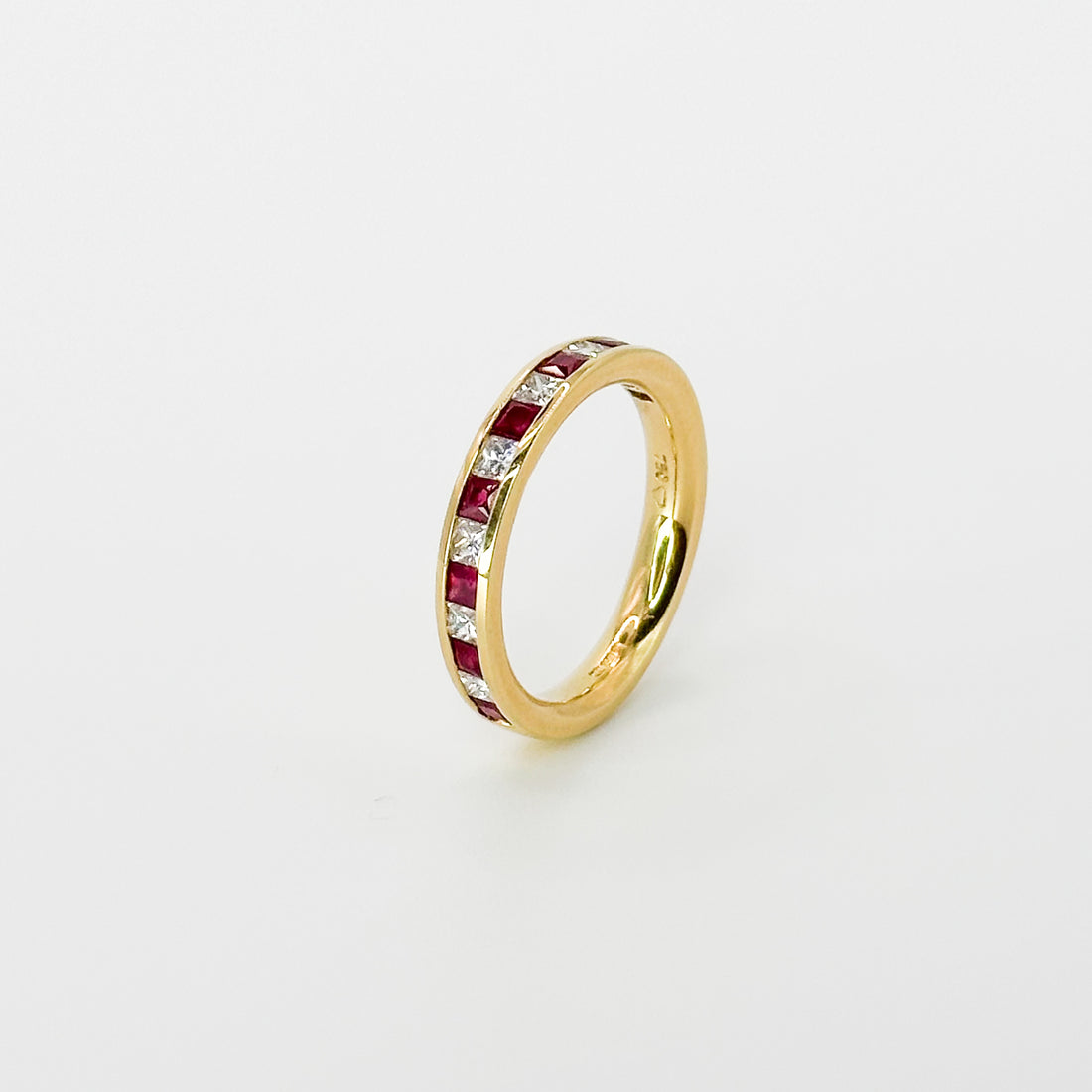 Ruby and Diamond Eternity Ring in Yellow Gold