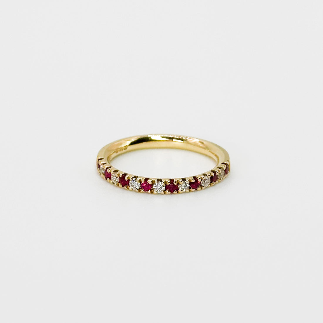 Ruby and Diamond Eternity Ring in Yellow Gold