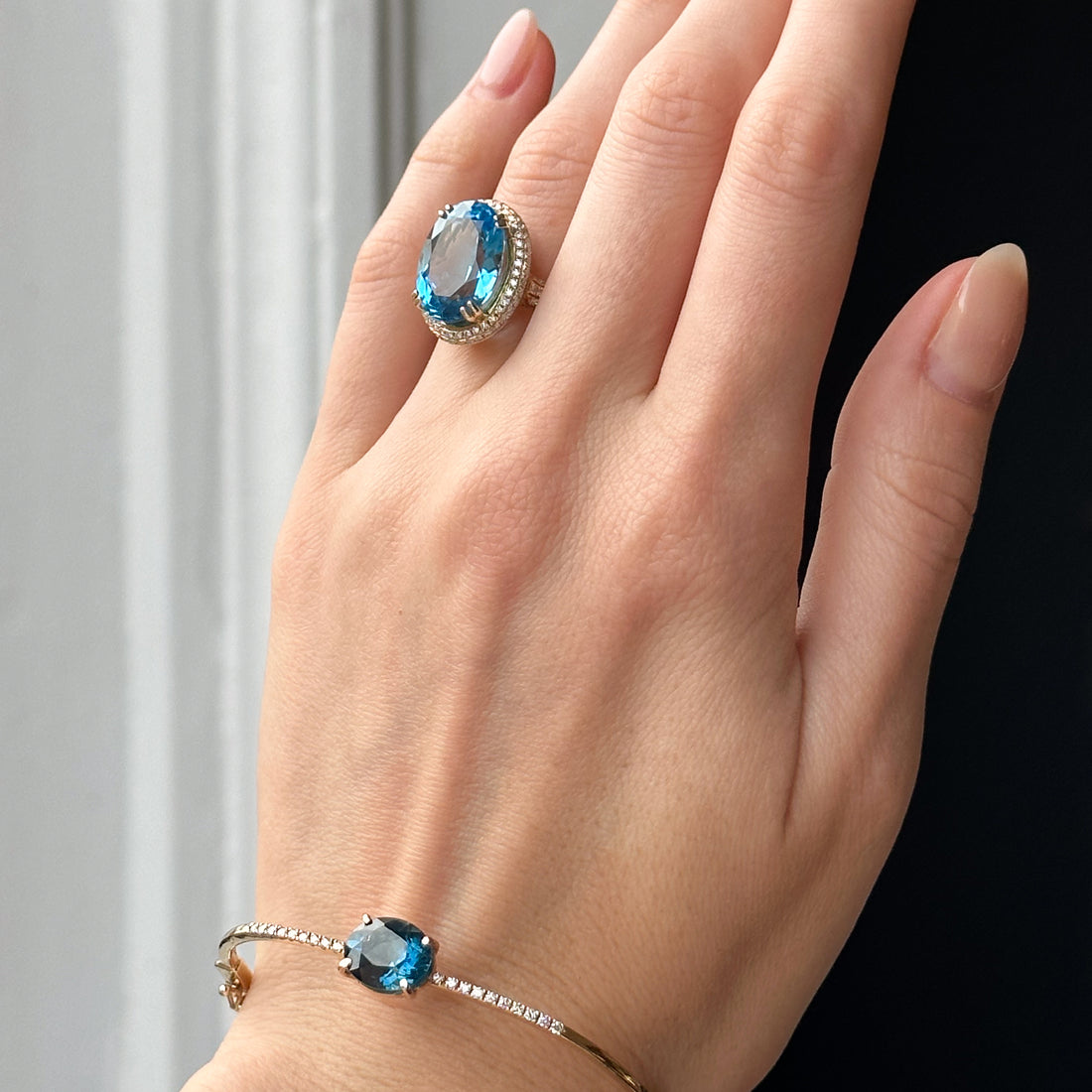 Blue Topaz Oval Cut Ring with Diamonds