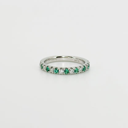 Diamond and Emerald Eternity Ring in Platinum