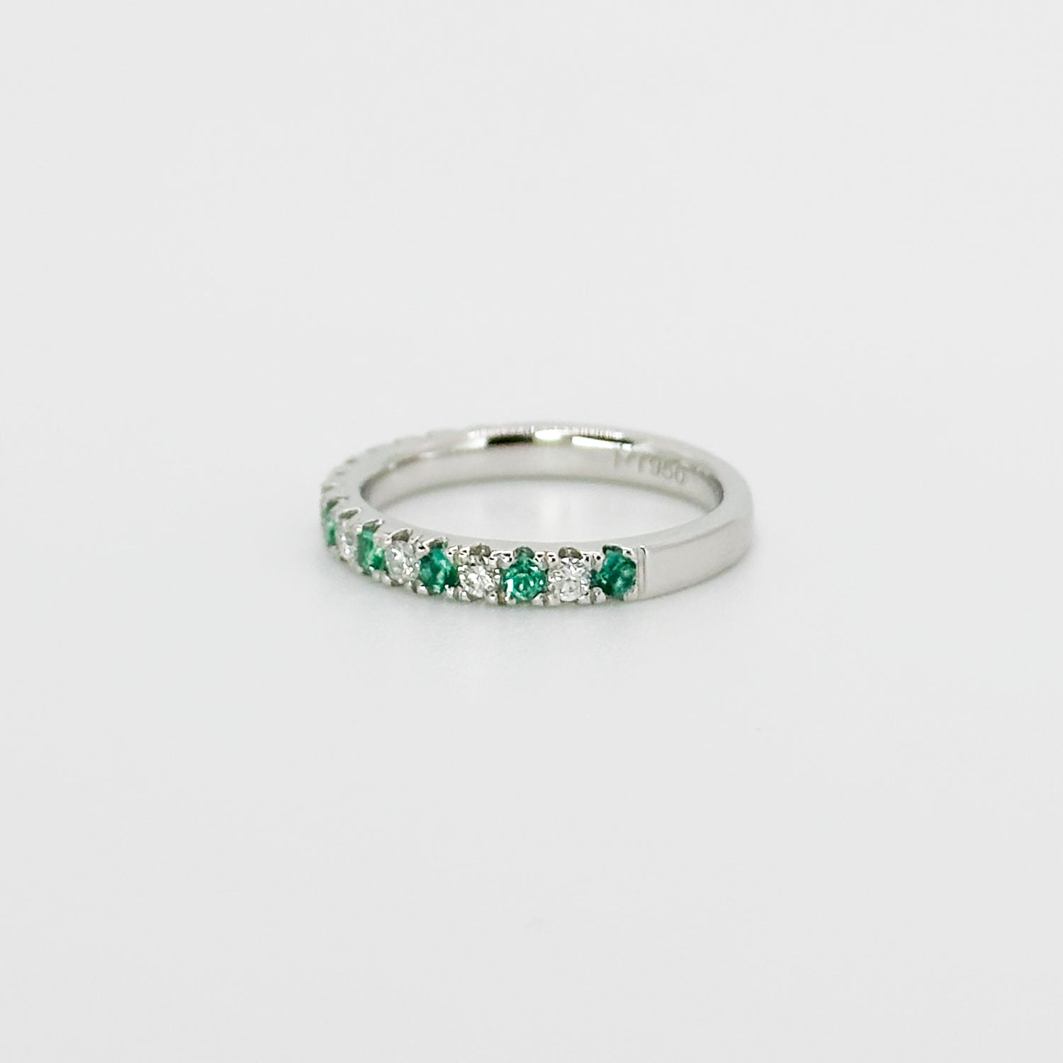 Diamond and Emerald Eternity Ring in Platinum