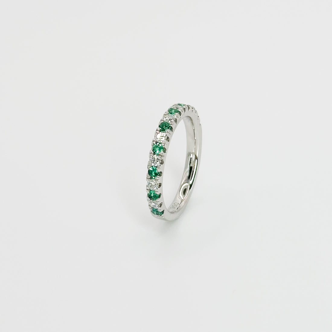 Diamond and Emerald Eternity Ring in Platinum
