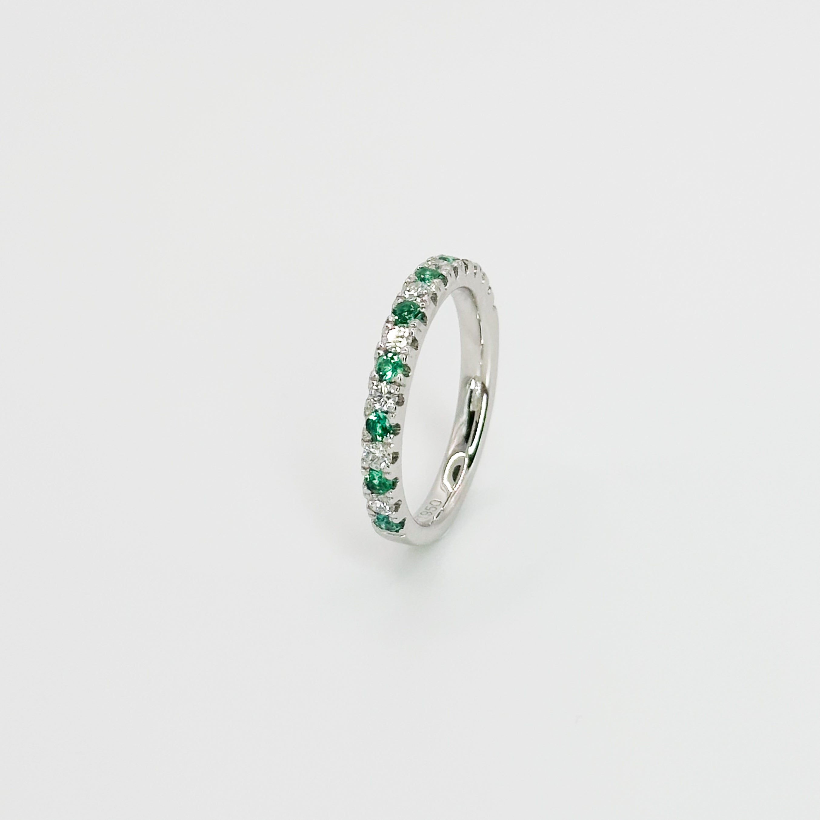 Diamond and Emerald Eternity Ring in Platinum