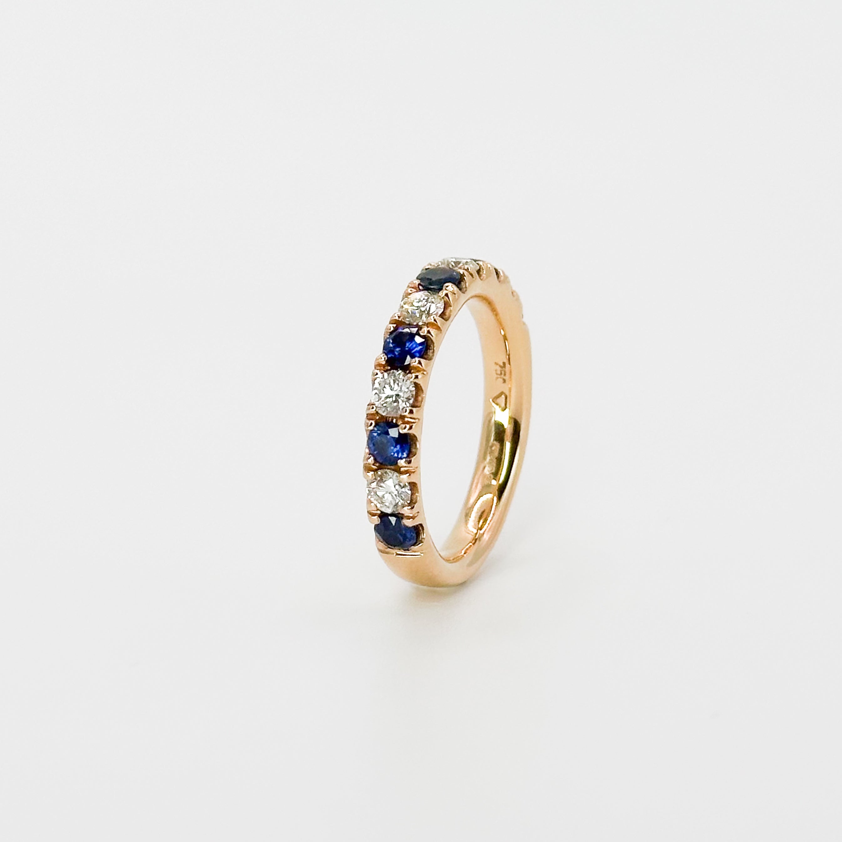 Diamond and Sapphire Eternity Ring in Rose Gold