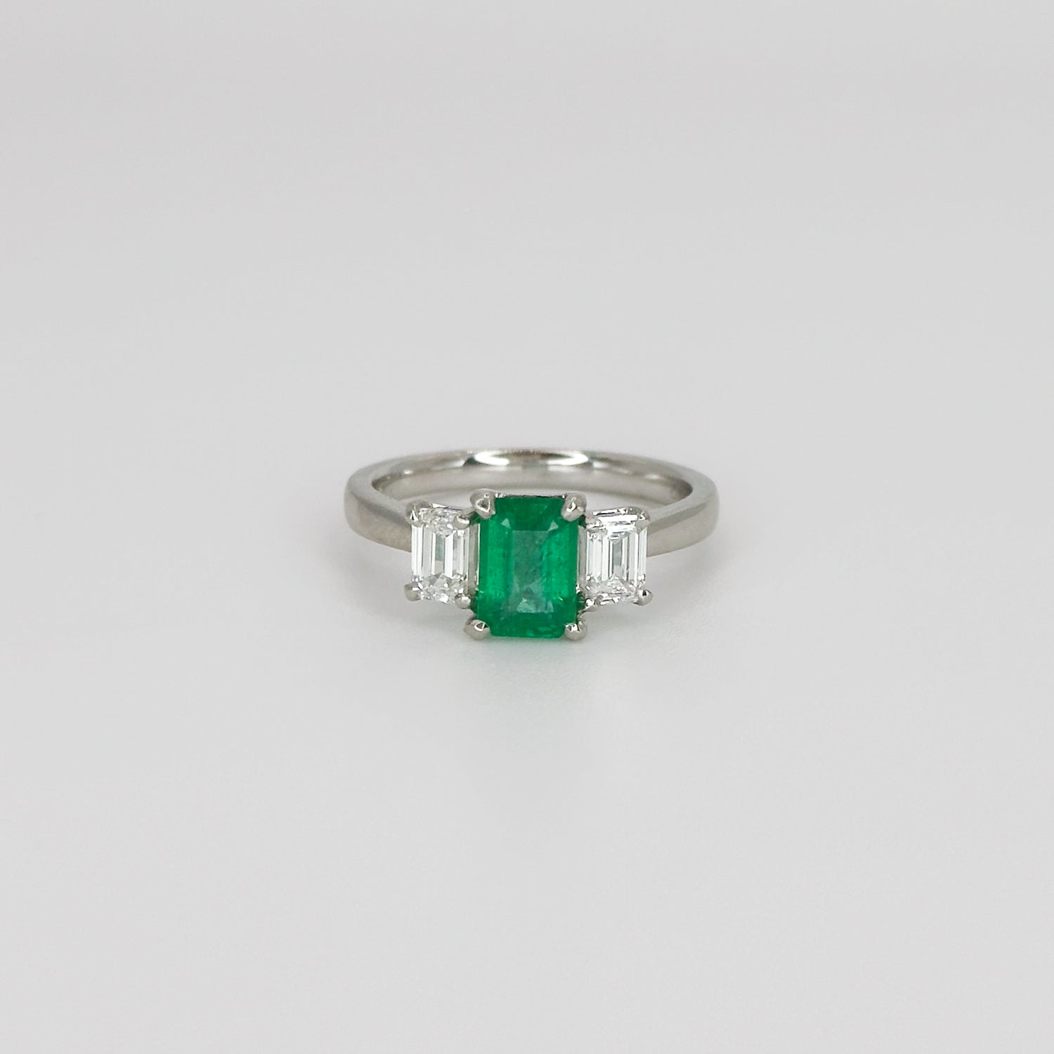 Emerald and Diamond Trilogy Platinum Ring