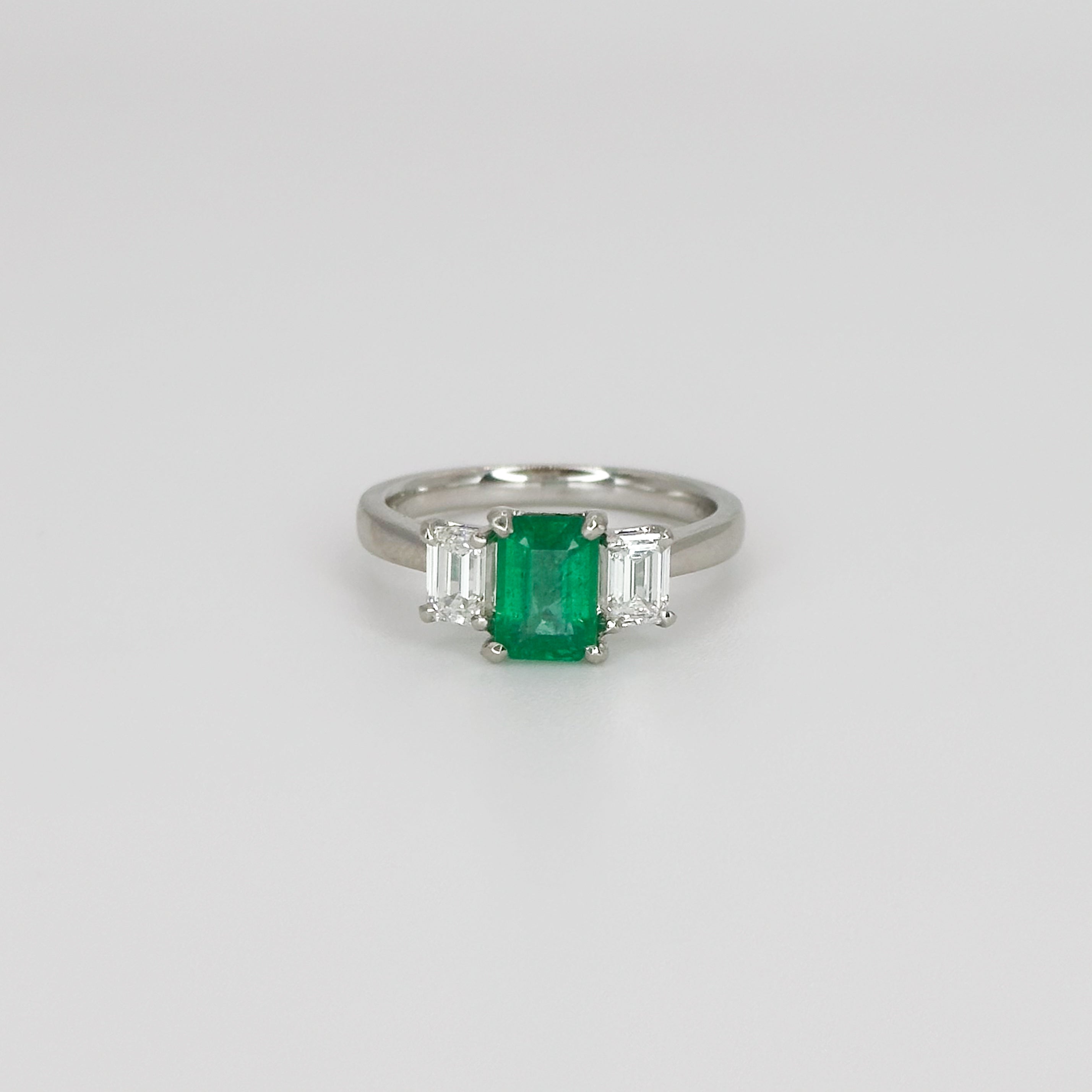 Emerald and Diamond Trilogy Platinum Ring