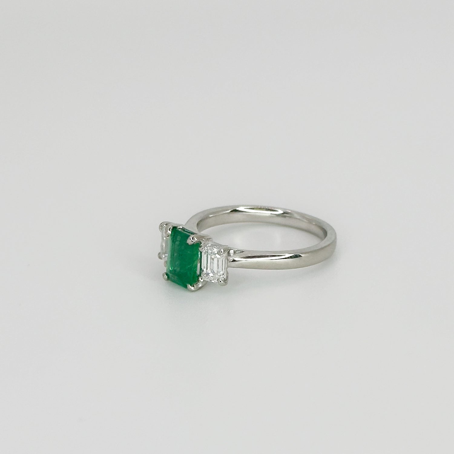 Emerald and Diamond Trilogy Platinum Ring