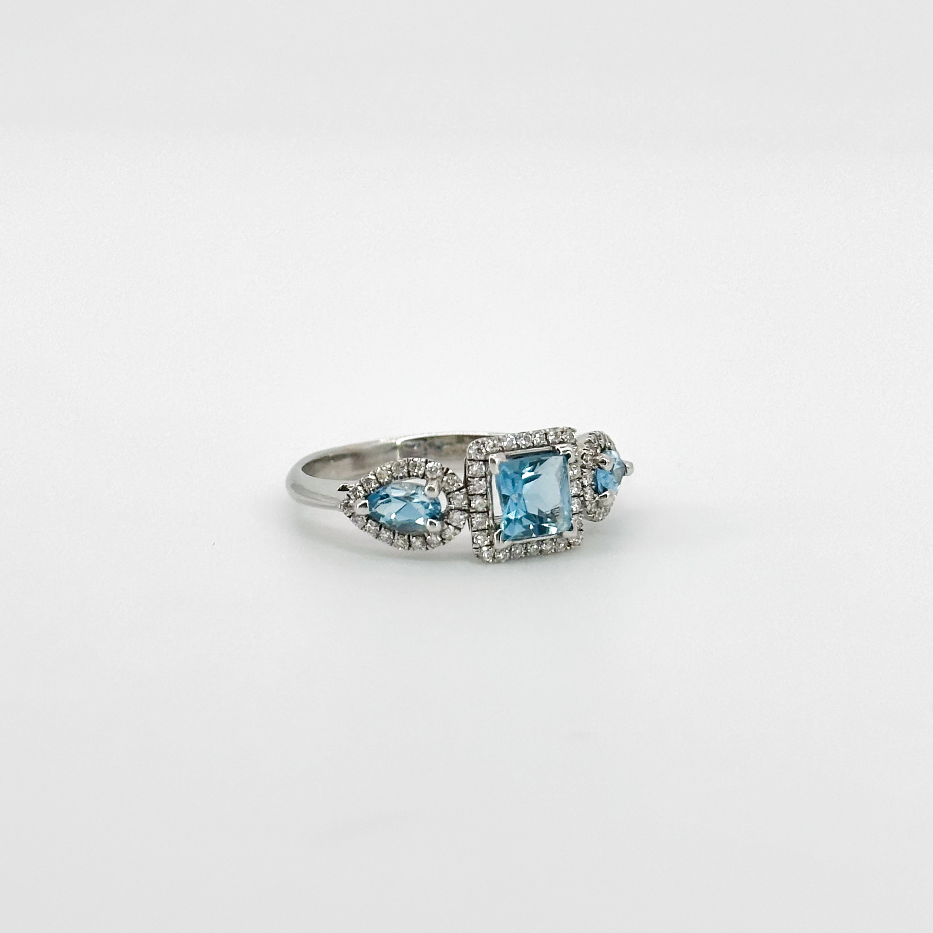 Blue Topaz Trilogy with Diamond Halo