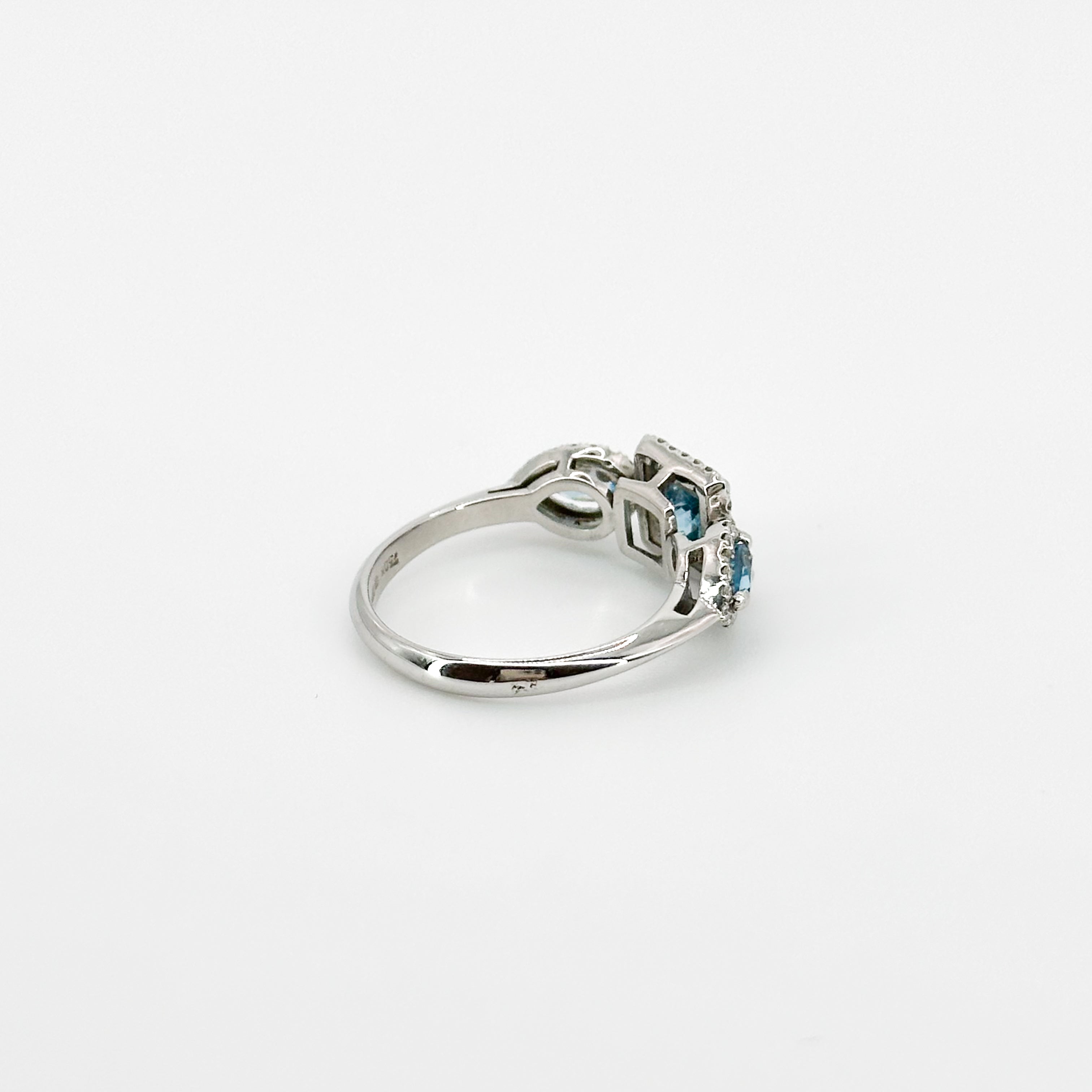 Blue Topaz Trilogy with Diamond Halo